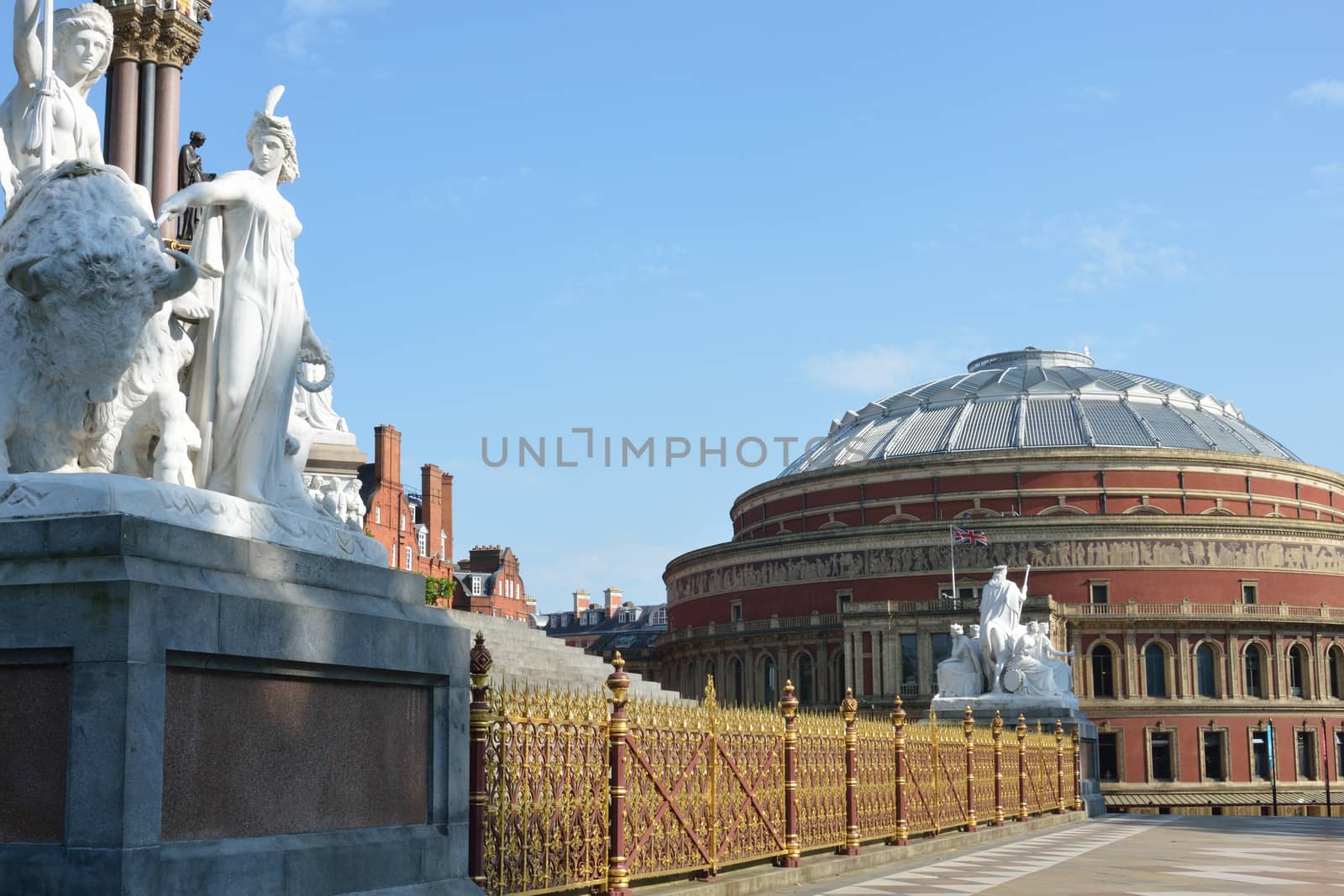 Statues and fence of memorial overlooking  Hall by pauws99