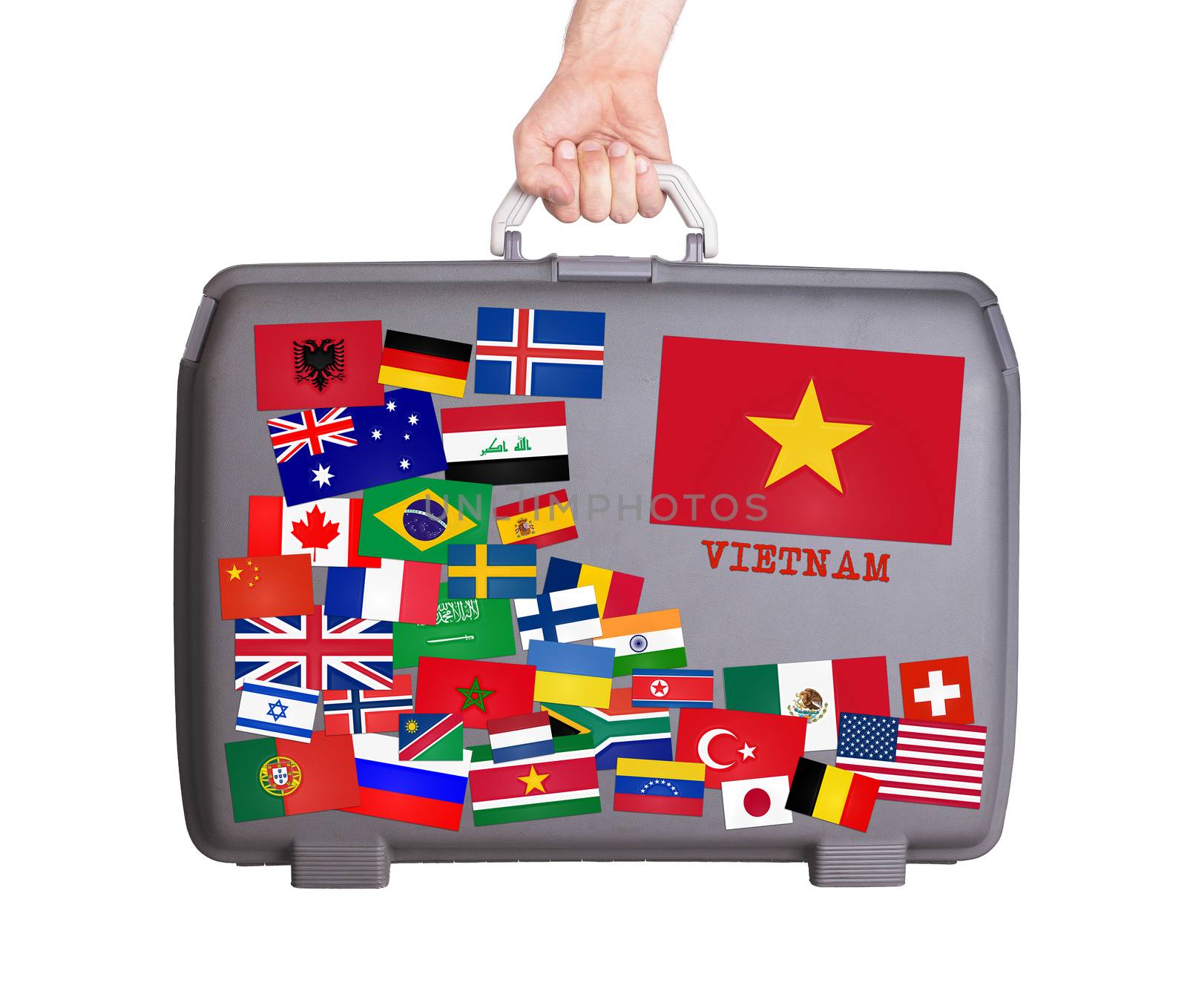 Used plastic suitcase with lots of small stickers, large sticker of Vietnam
