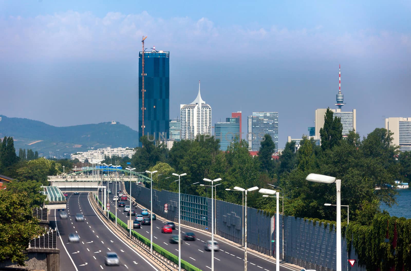 VIENNA, AUSTRIA - AUGUST 6: Vienna city highway  with Reichsbruecke (Empire Bridge) and the brand new DC-Tower, Austria