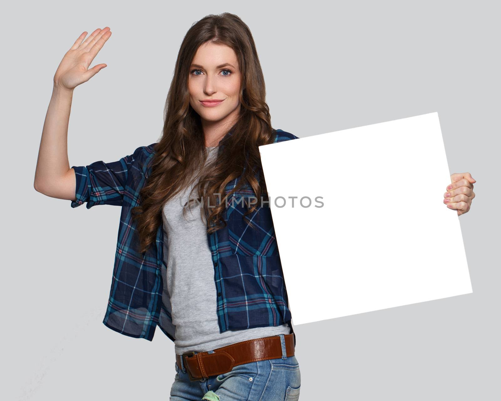 Beautiful woman with white billboard