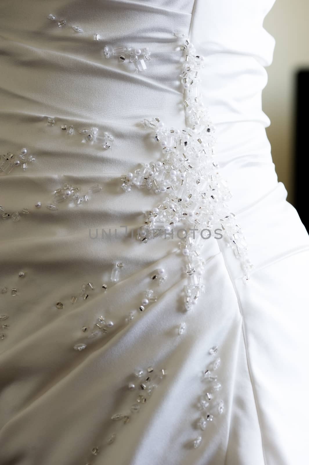 Wedding dress closeup by kmwphotography