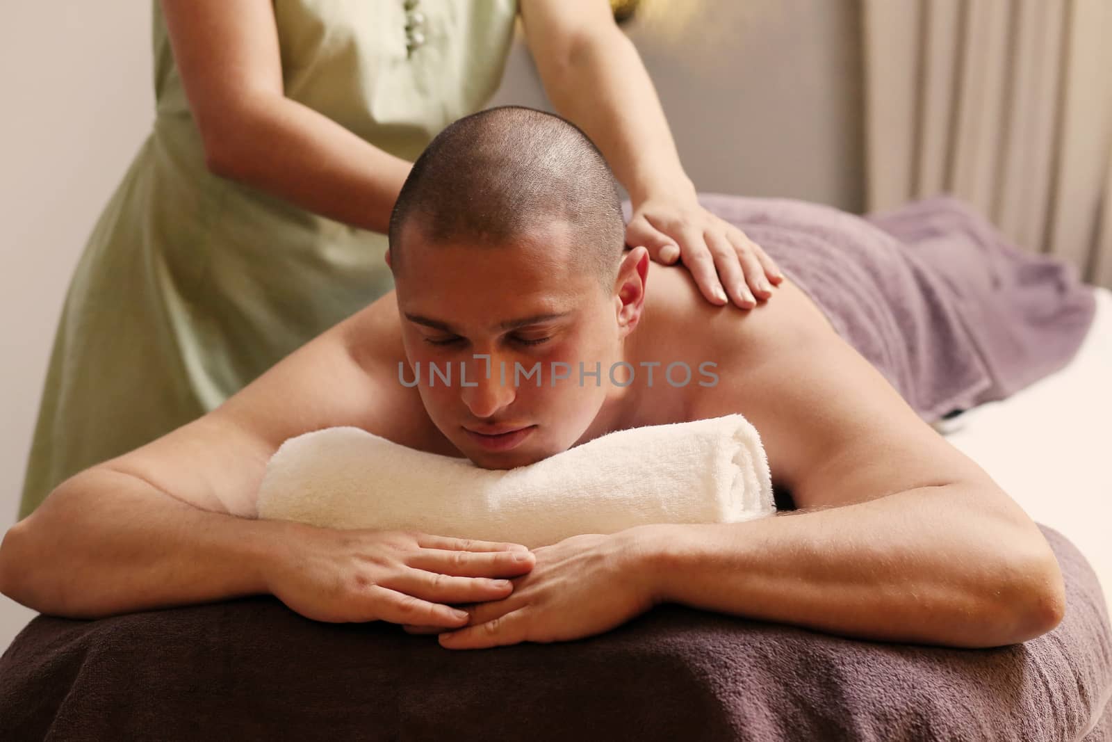 Beauty, health. Man in spa salon