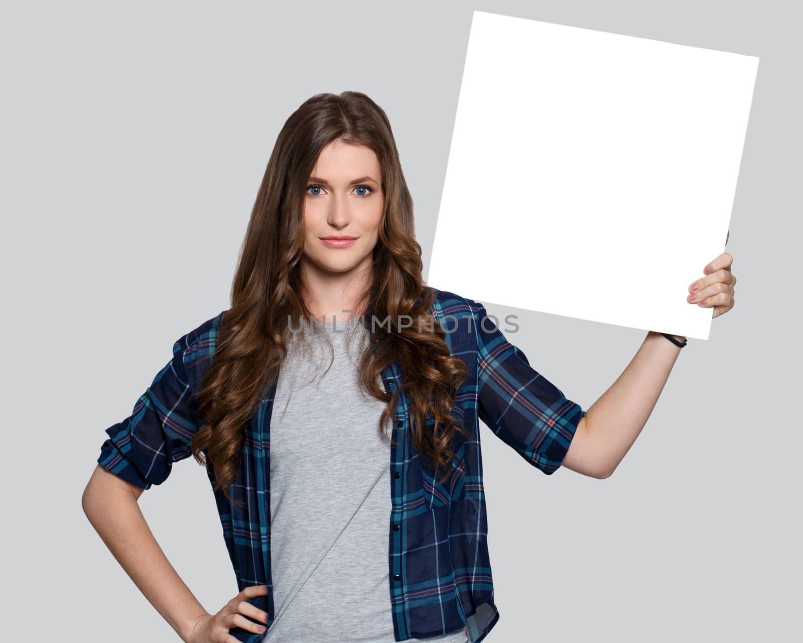 Beautiful woman with white billboard