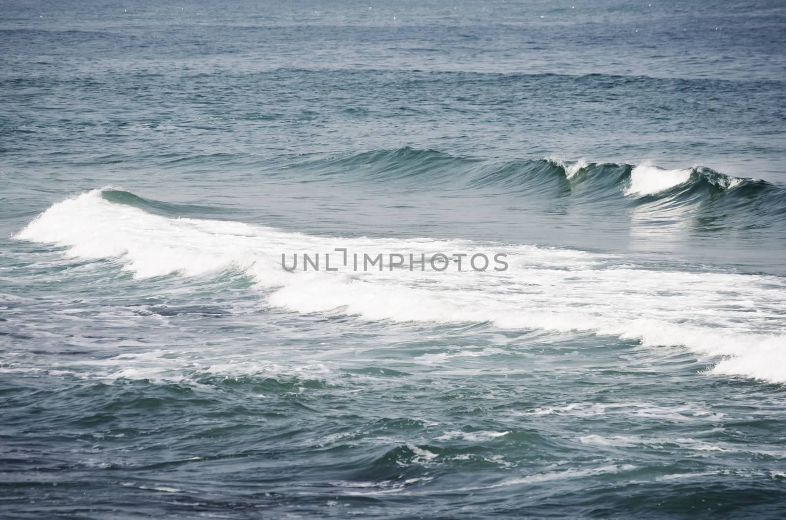 Photo of the Wavy Sea Blue Background 