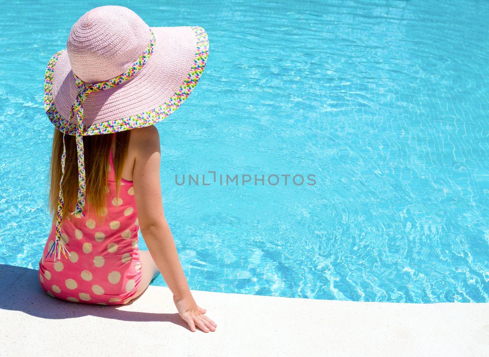 Young girl sat by the pool  by freila