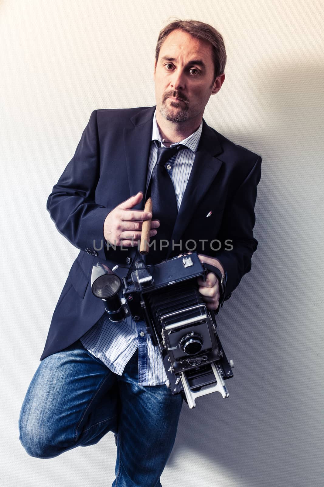 Photographer with vintage camera by sumners