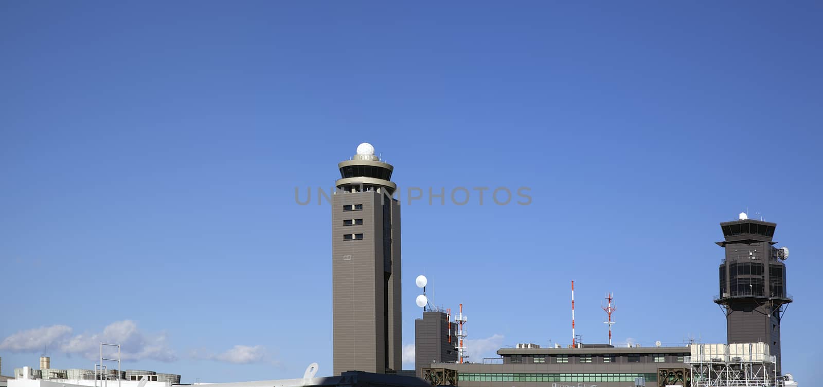 Narita Tokyo Airport Air Traffic Control Tower Against Blue Sky Panorama