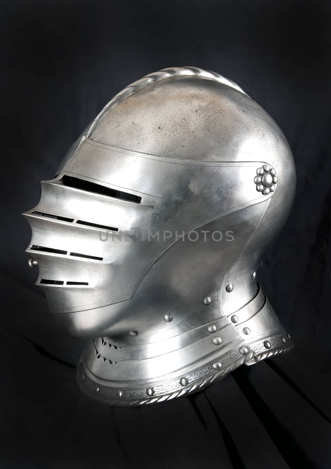 Iron helmet of the medieval knight. Very heavy headdress