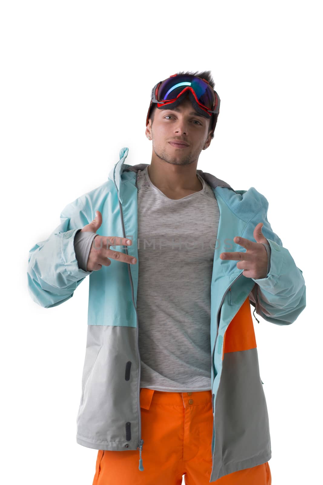 Friendly attractive young male skier or snowboarder isolated on white, doing sign with fingers