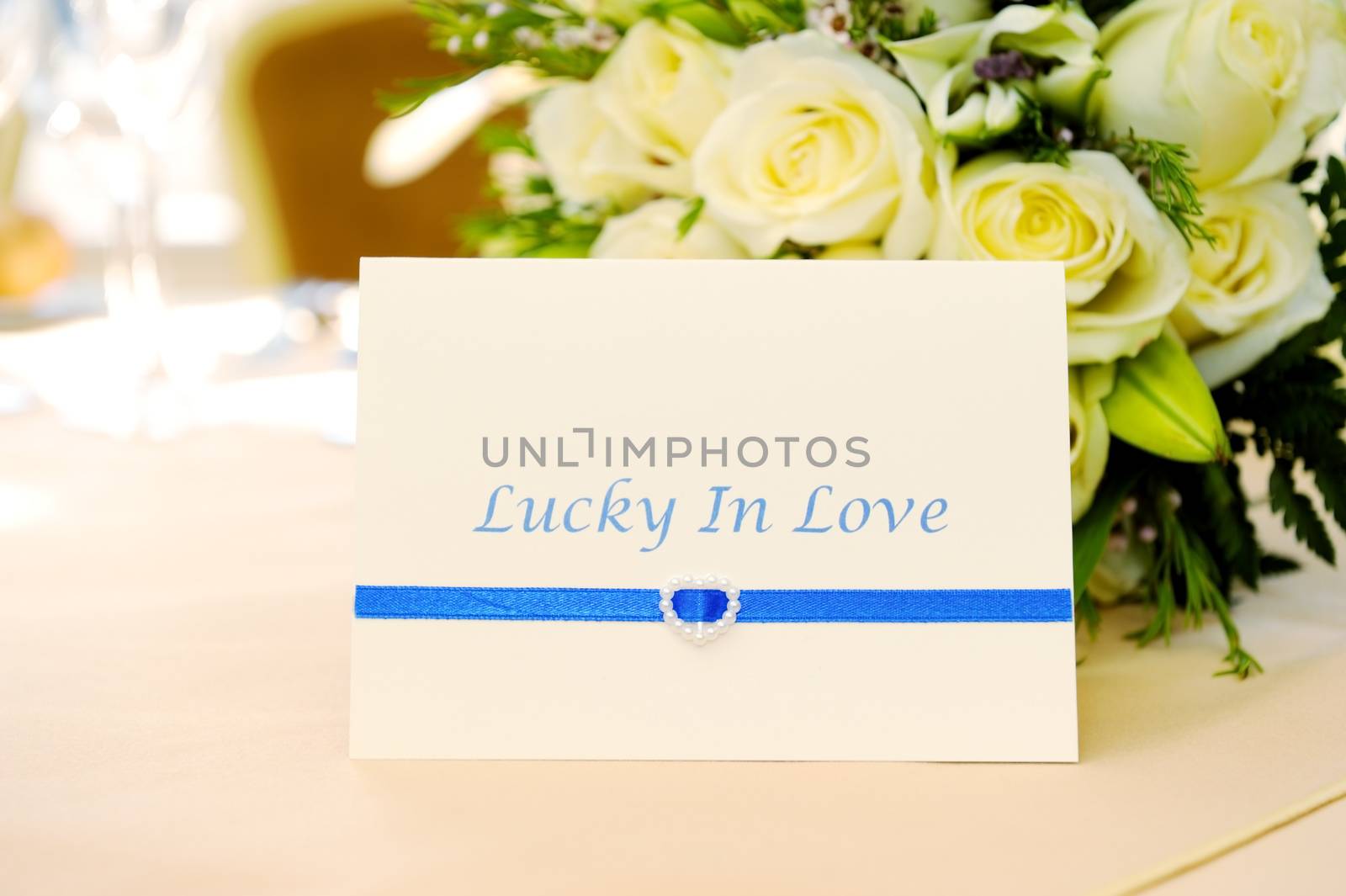 Closeup wedding reception decoration card and flowers