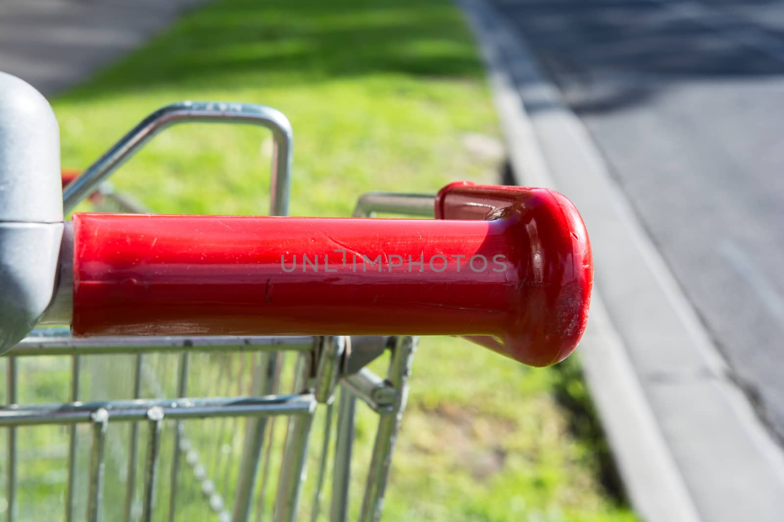 the red trolley handle at the road side