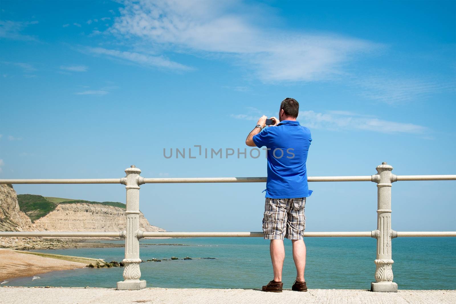 An image of a photographer at Hastings England