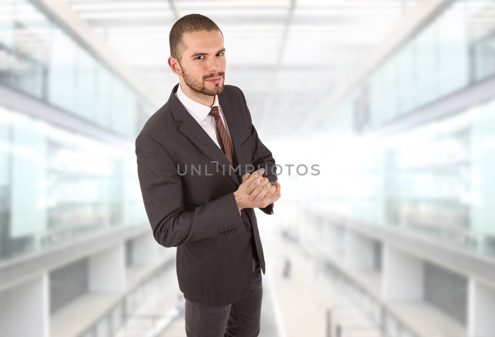 young happy business man at the office