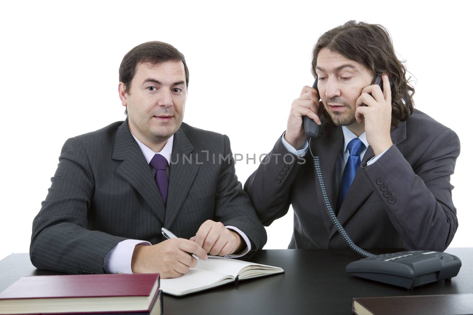 business team working at a desk, isolated on white