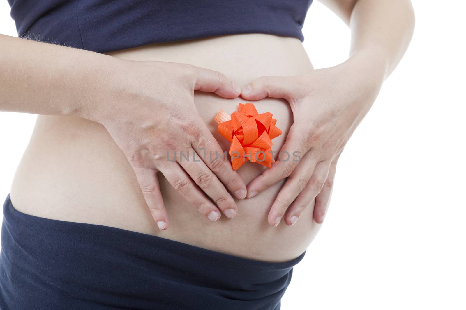 Closeup of pregnant woman at white background