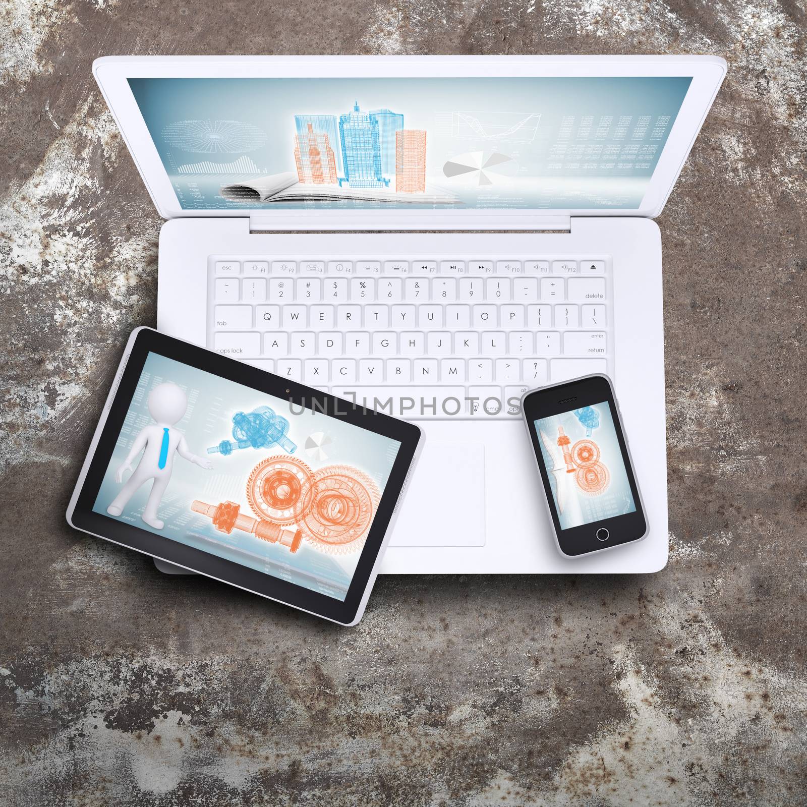 Laptop, tablet pc and smart phone on old metal surface. Computer technology concept