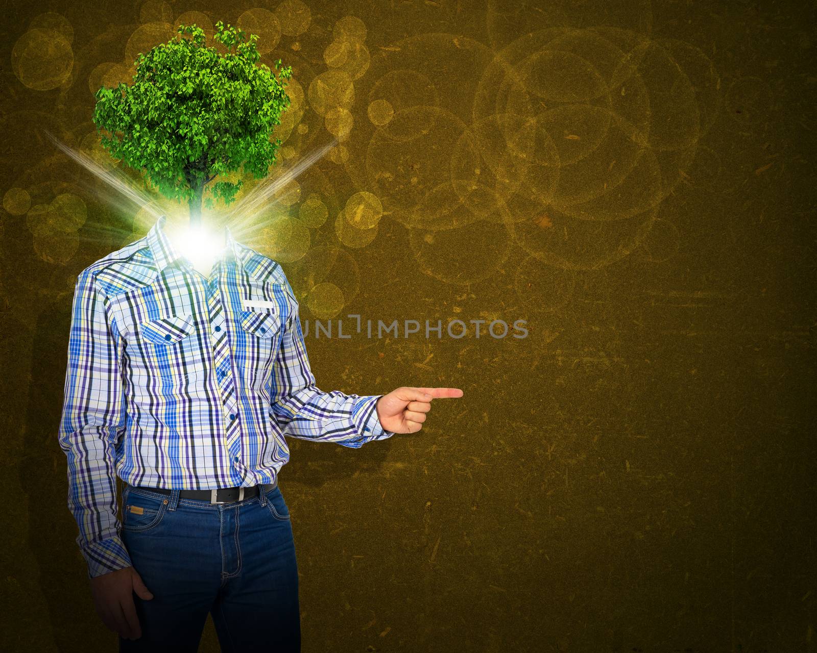 Man stand with green tree and bright light instead his head. Eco concept