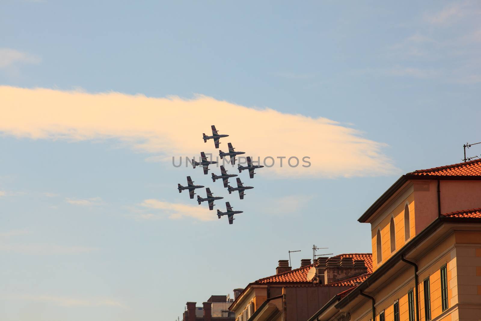 TRIESTE, ITALY - JUNE, 01: View of Italian military airplane called frecce tricolore "tricolor arrows" in acrobatics on June 01, 2014