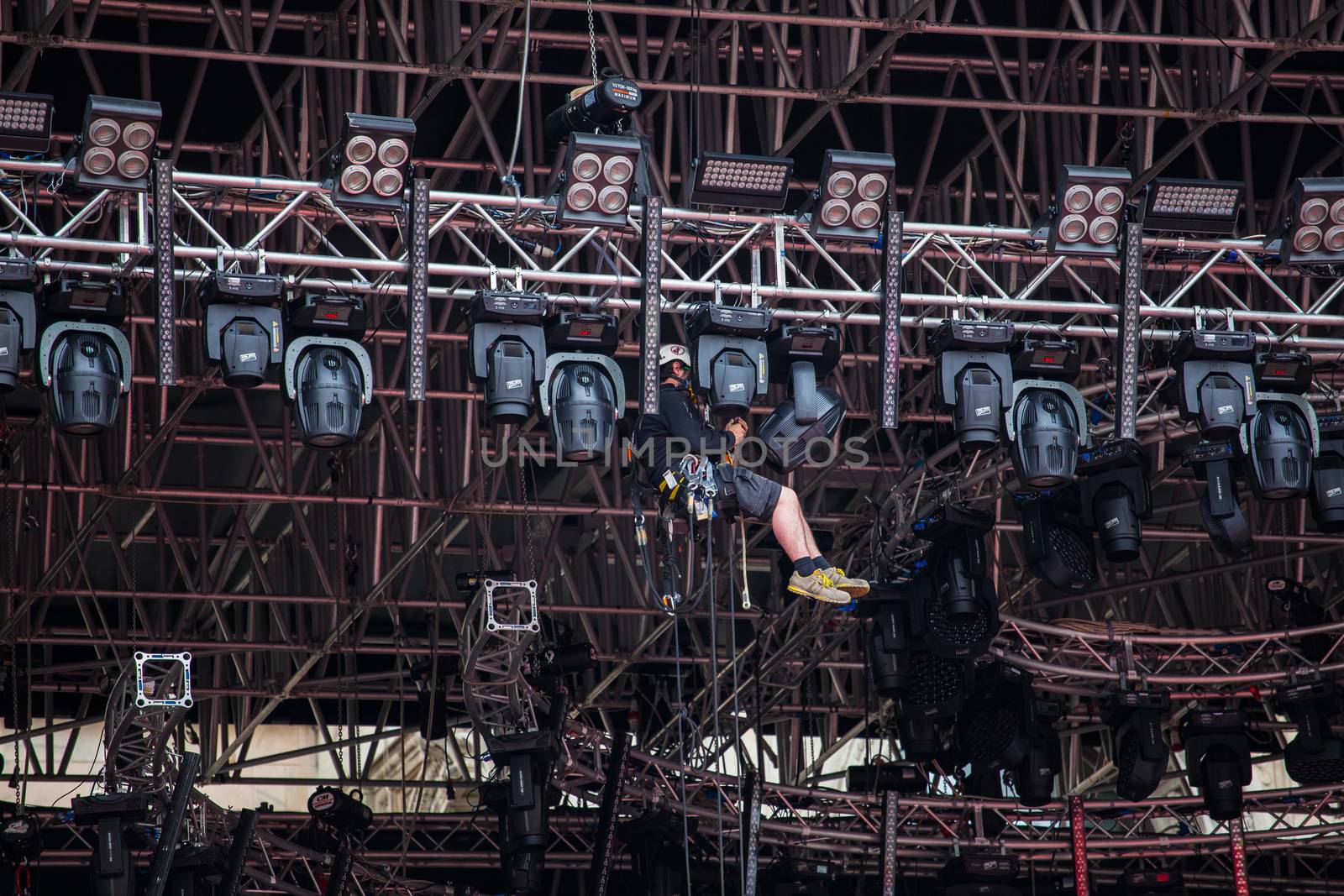 View of stage riggers working at height