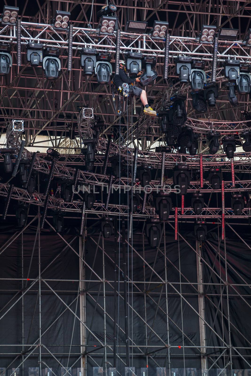 View of stage riggers working at height