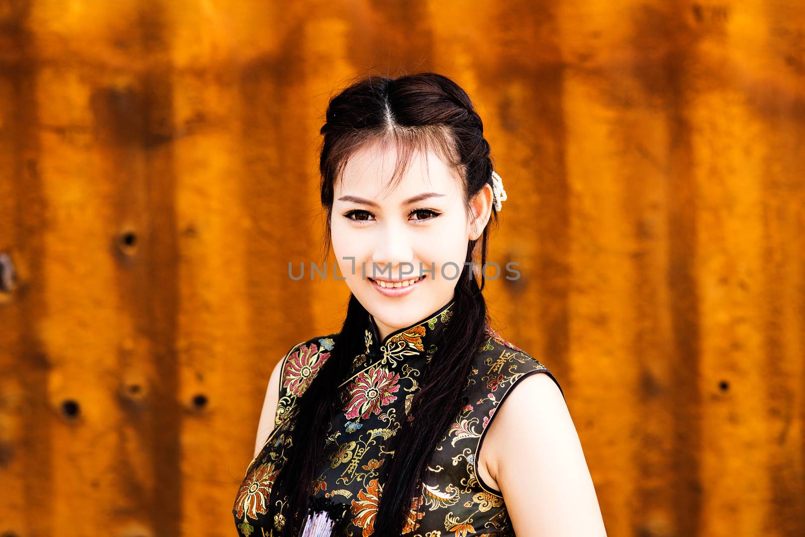 Chinese girl in traditional Chinese cheongsam blessing by Yuri2012