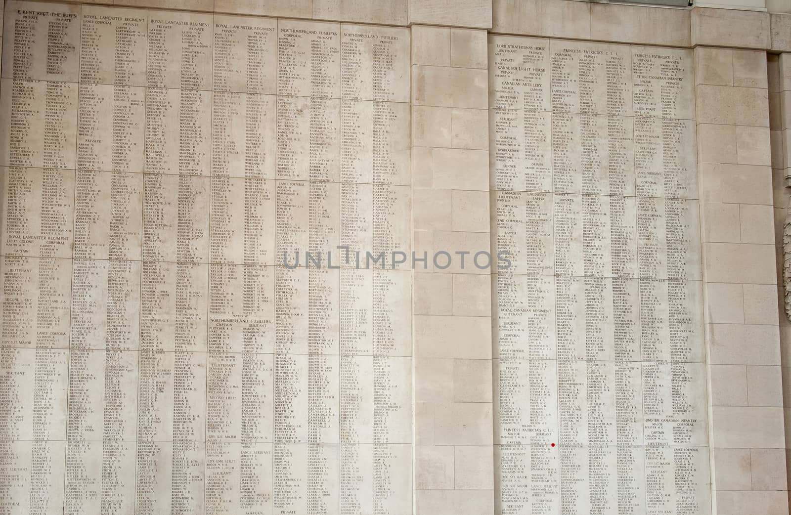 Ypres Menin gate memorial showing names of falling soldiers.