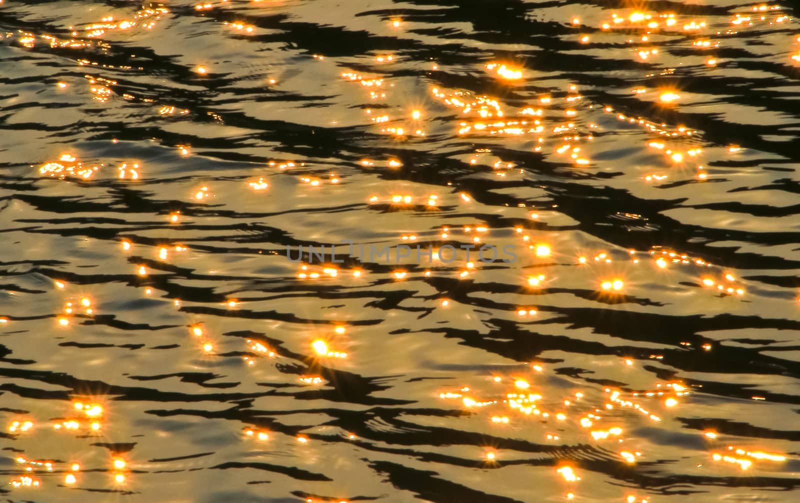 scintillate sunlight, in the river background