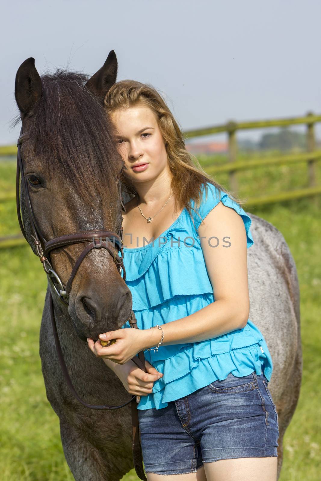 young girl and her horse by miradrozdowski