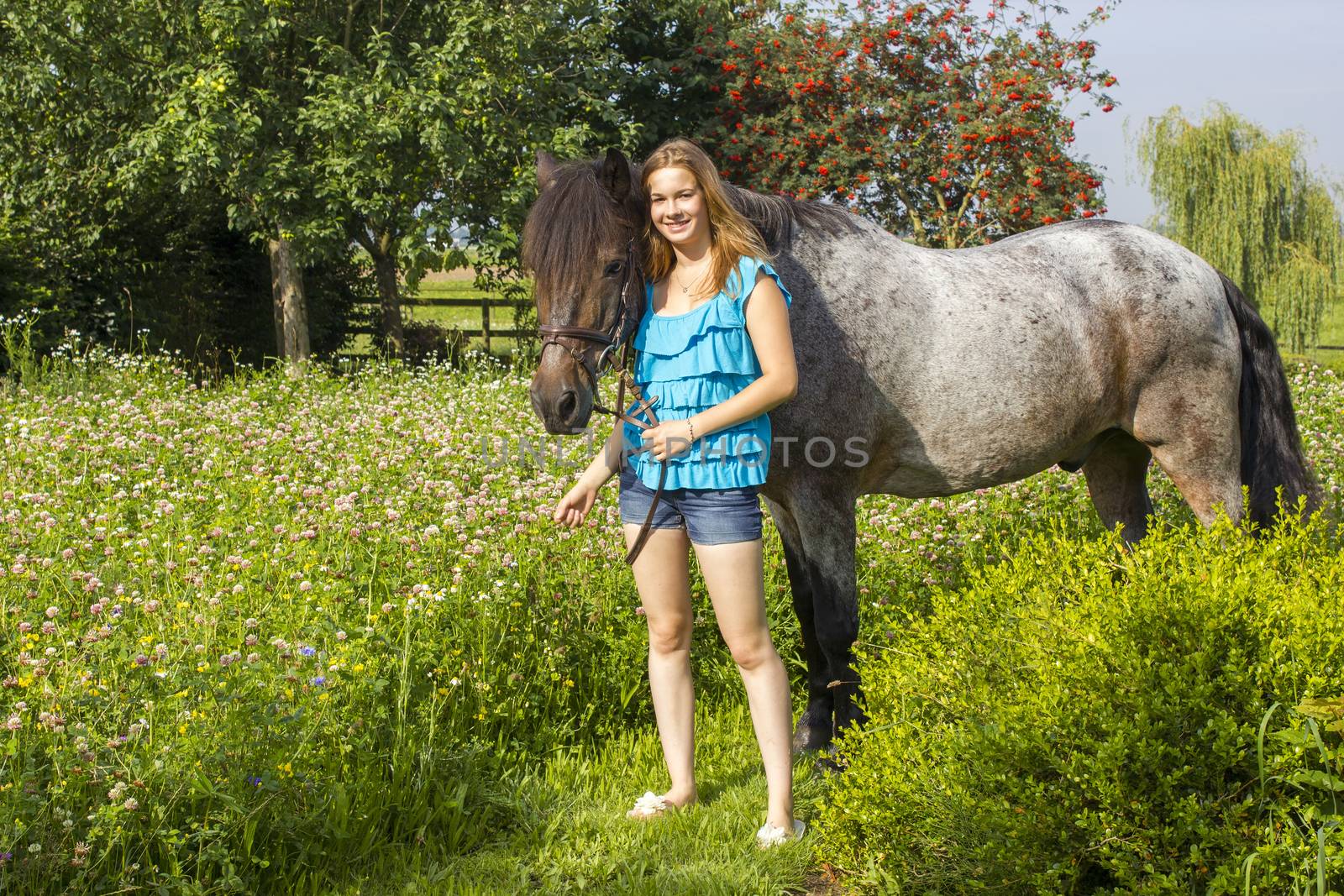 young girl and her horse by miradrozdowski