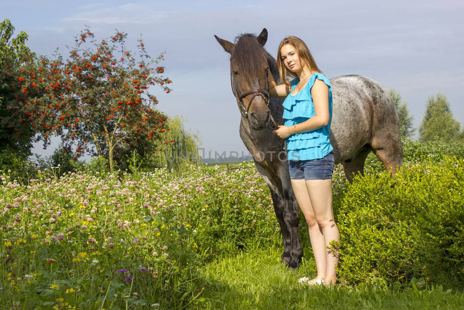 young girl and her horse by miradrozdowski