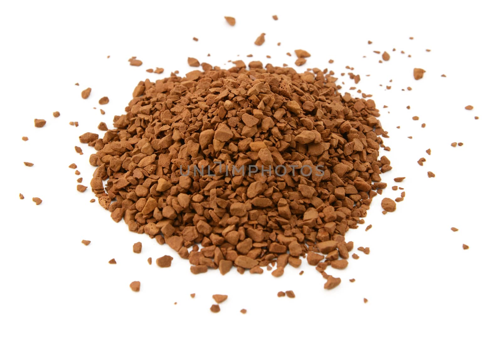 Heap of instant coffee granules, isolated on a white background