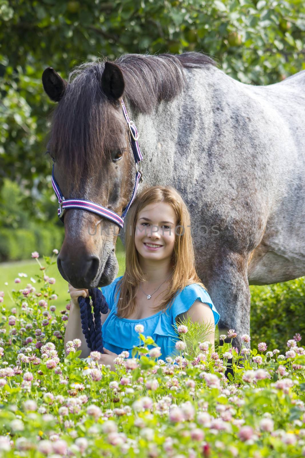 young girl and her horse by miradrozdowski