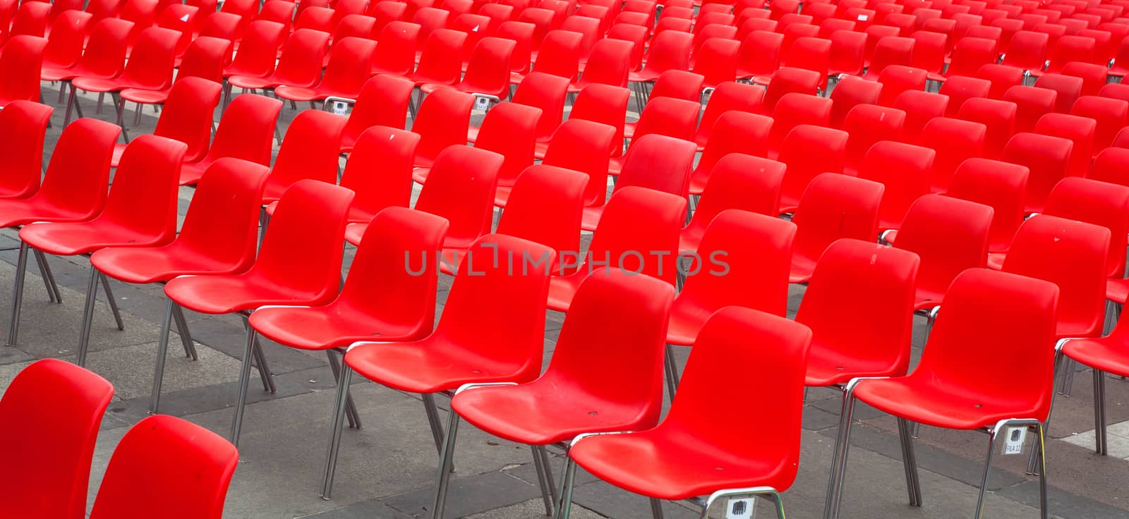 View of many red chairs ready for conference