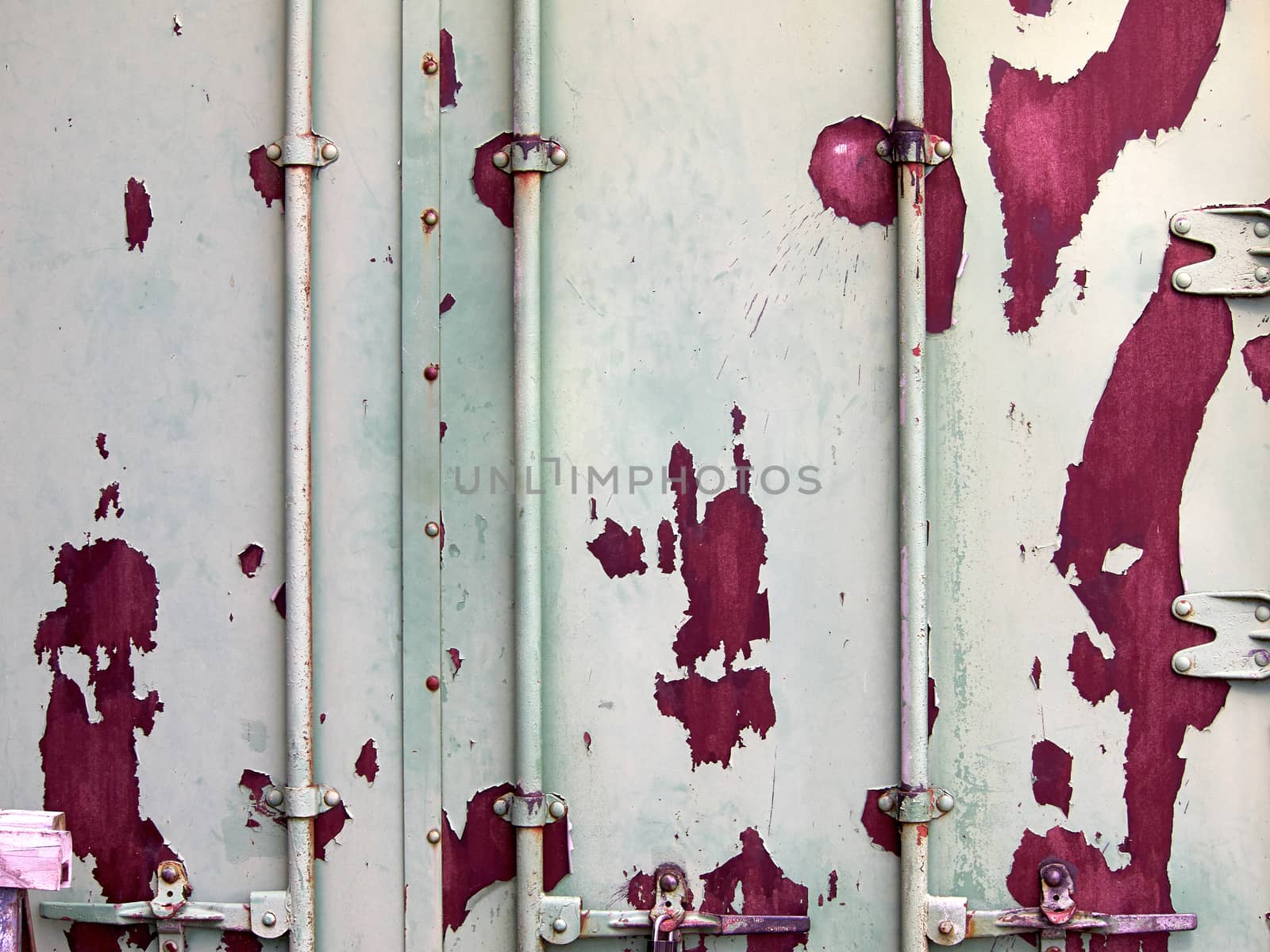 Closeup of cargo freight shipping containers with rust spots