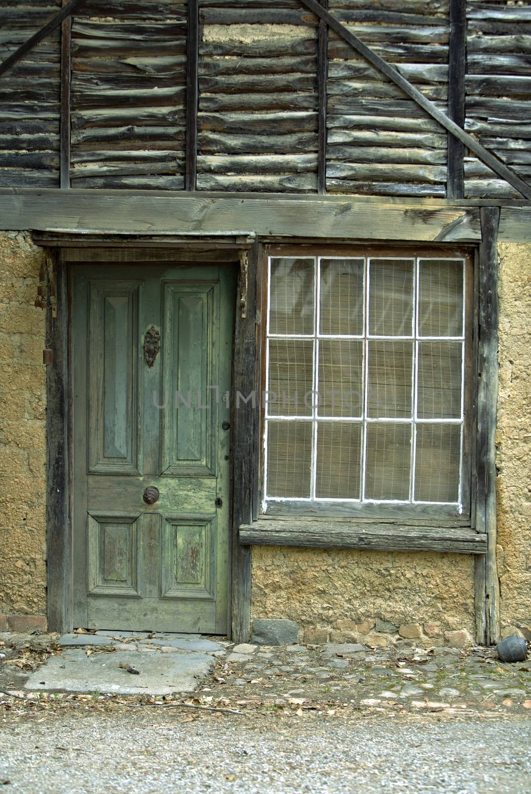 Weathered Green Door With an Aged Stone House, Home Related