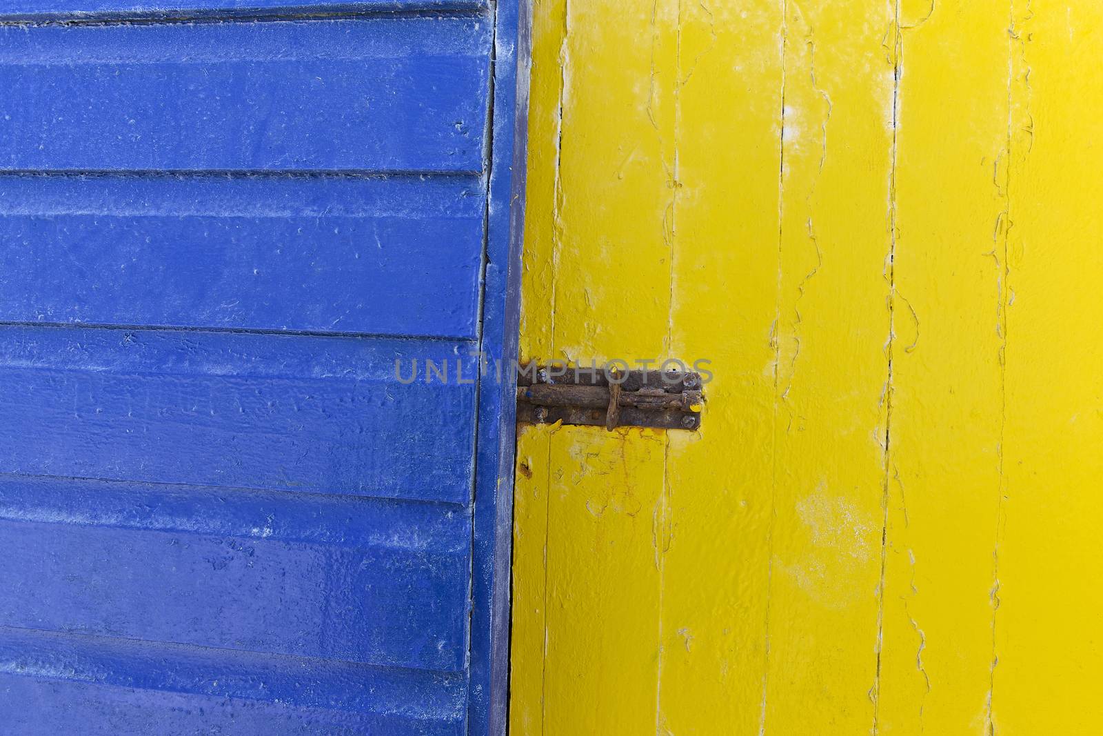 Brightly painted wooden hut, background