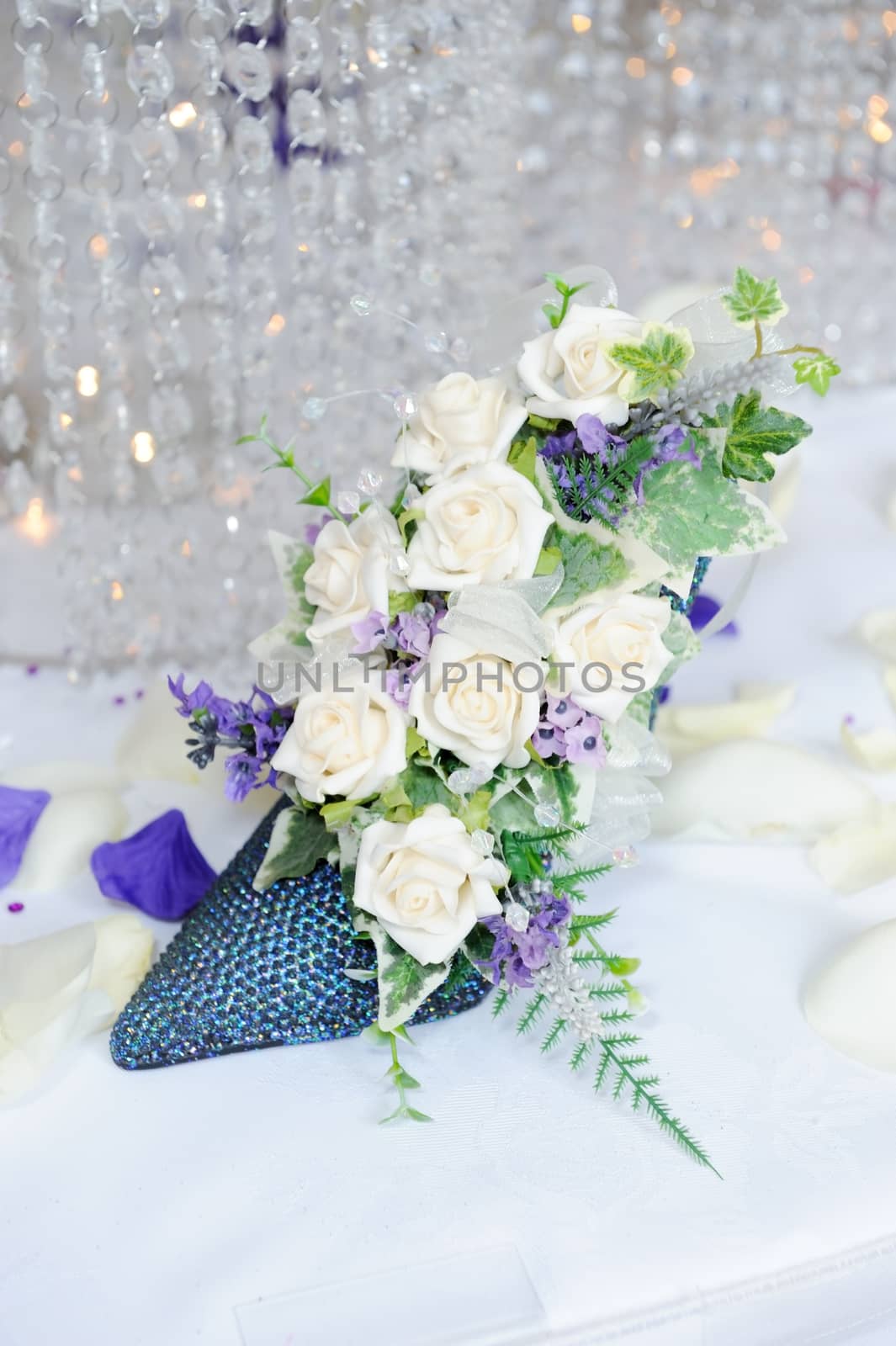 Flowers in shoe decoration at wedding reception