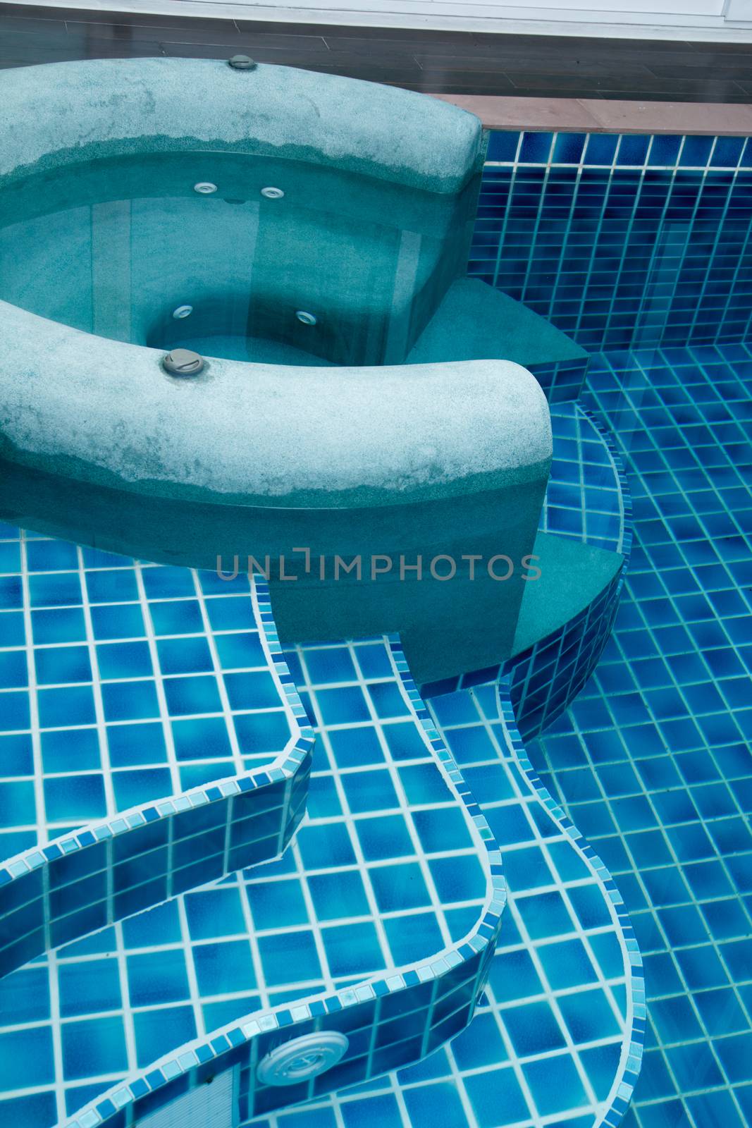 Jacuzzi in the swimming pool by letoakin