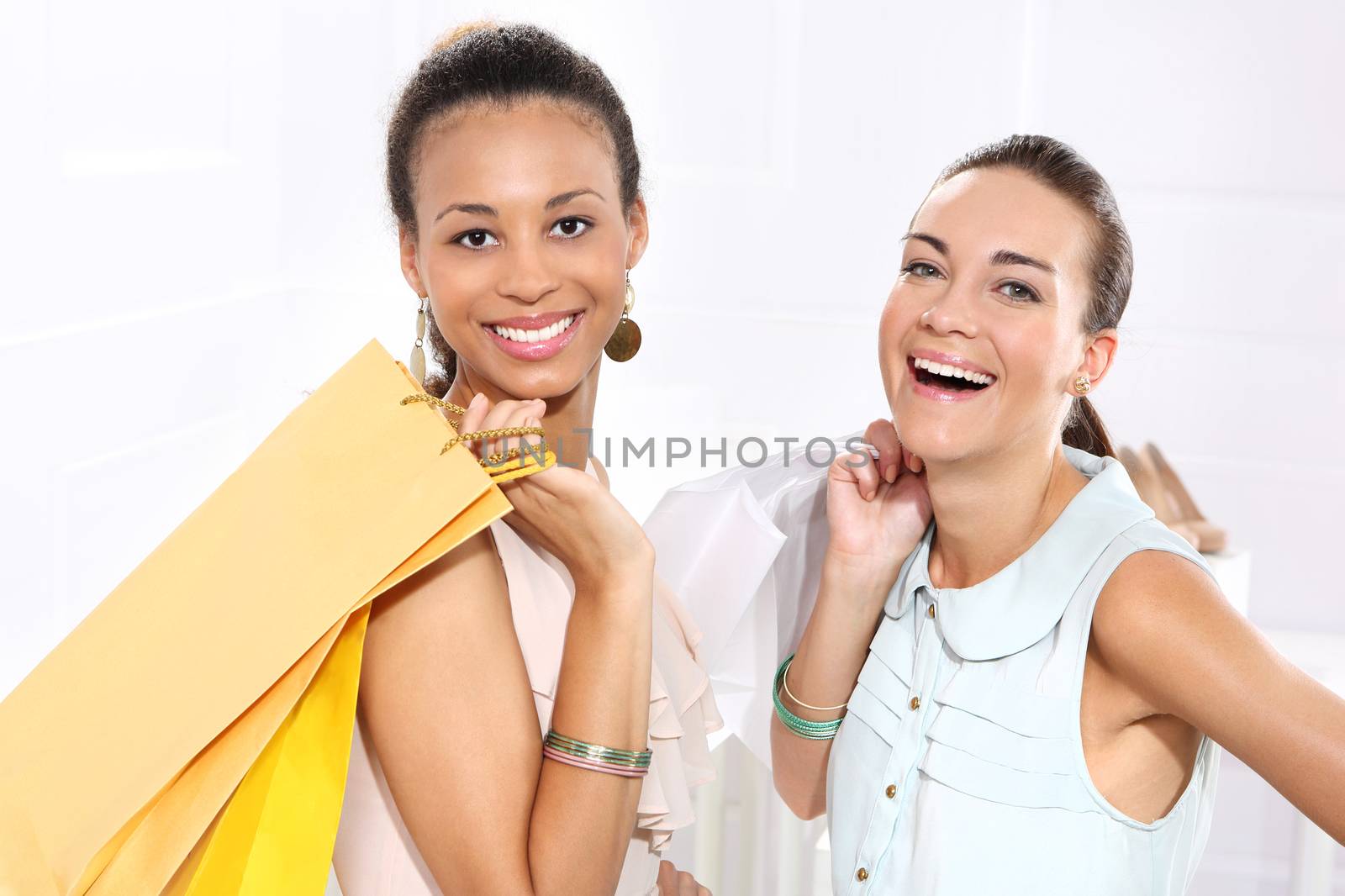 I love shopping! Women with shopping bags by robert_przybysz