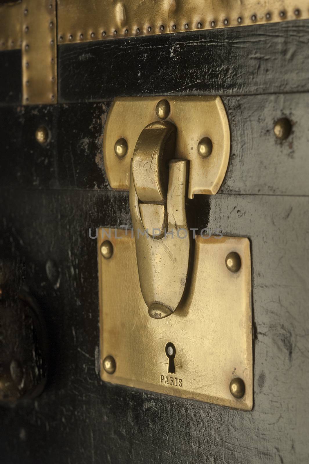 Brass lock on antique steamer trunk