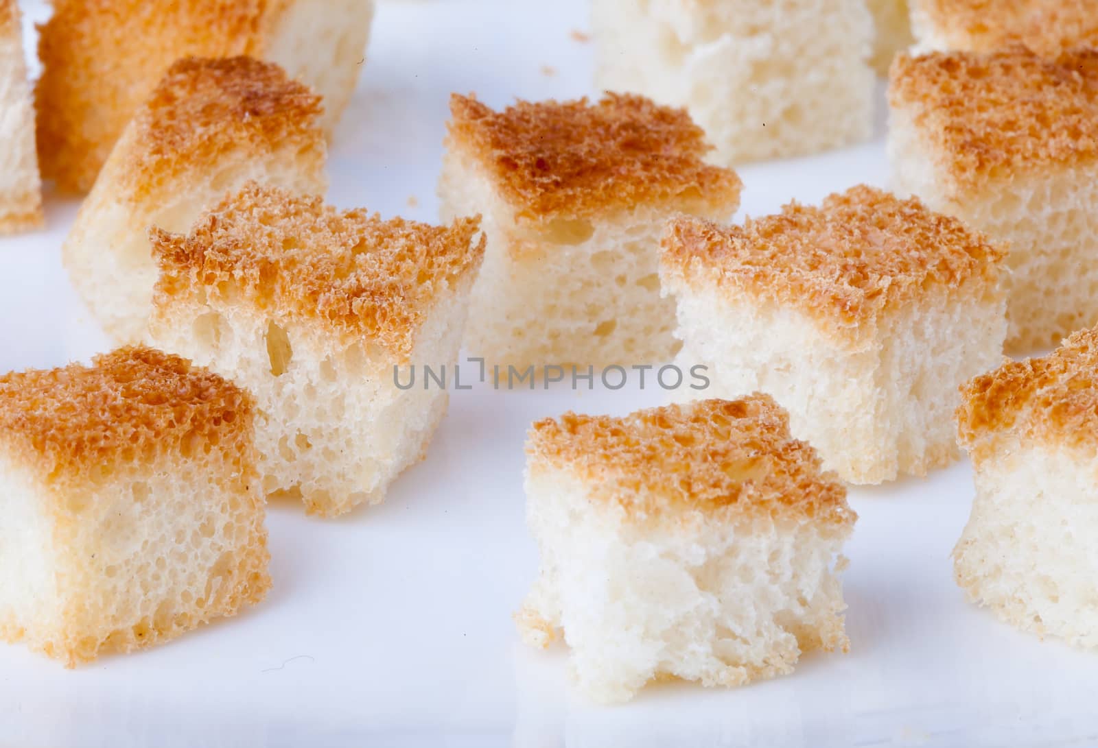 Fried brow pieaces of bread