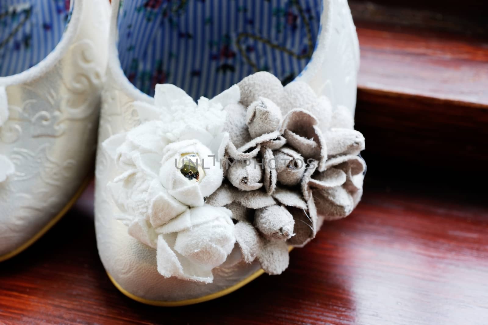 Brides shoe on wedding day closeup detail