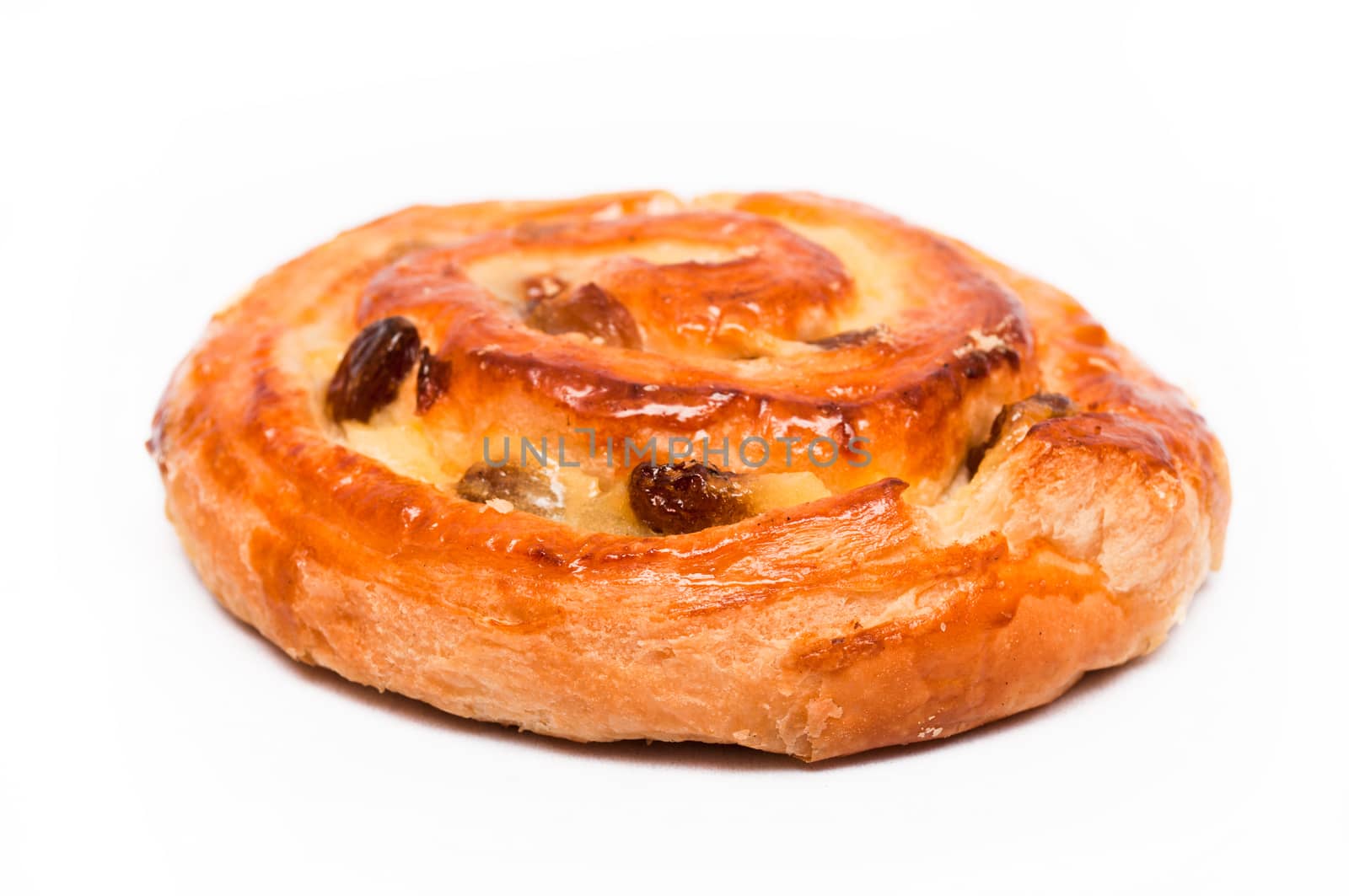 cinnamon roll raisins on white background