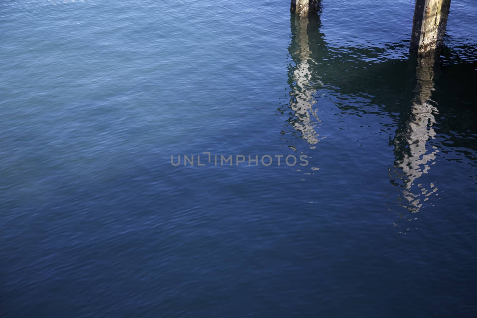 Water Surface Reflection With a Pier