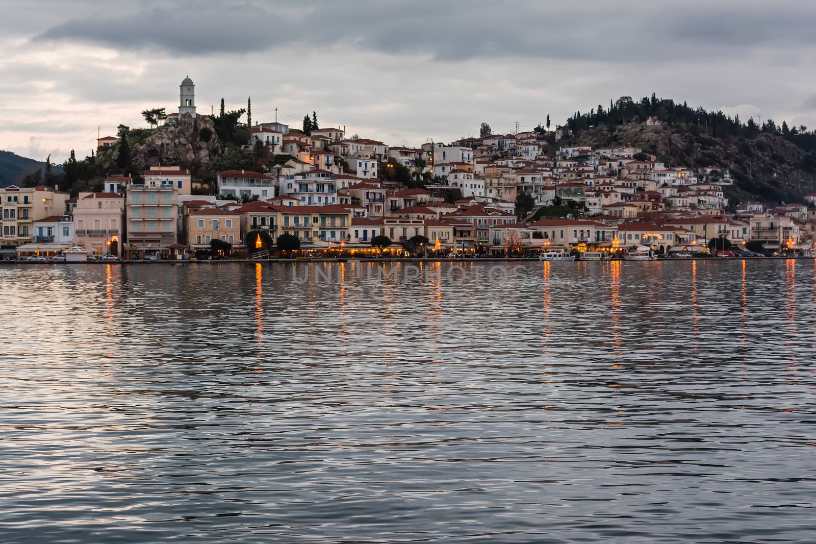 Greece, the port of Poros island at dusk