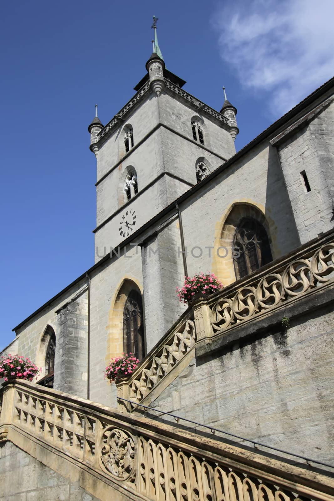 Church Saint-Laurent in Estavayer-le-Lac, Switzerland by beautiful weather