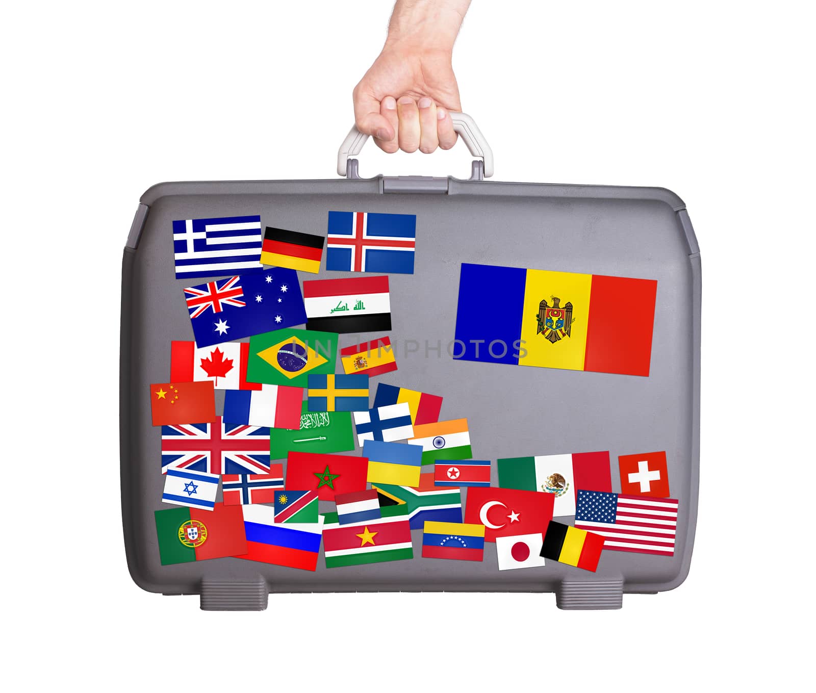 Used plastic suitcase with lots of small stickers, large sticker of Moldova
