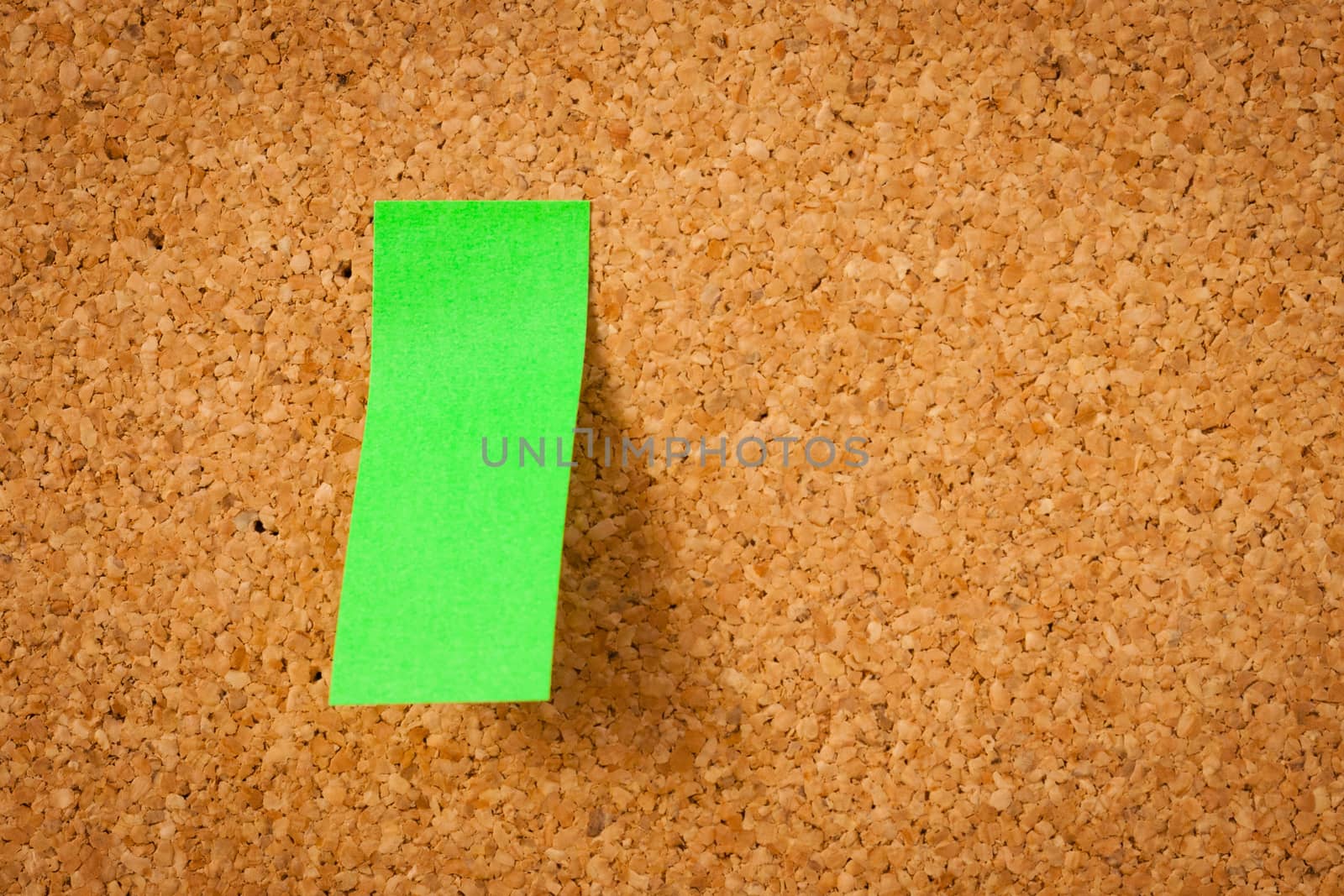 image of color blank post-it reminder on corkboard