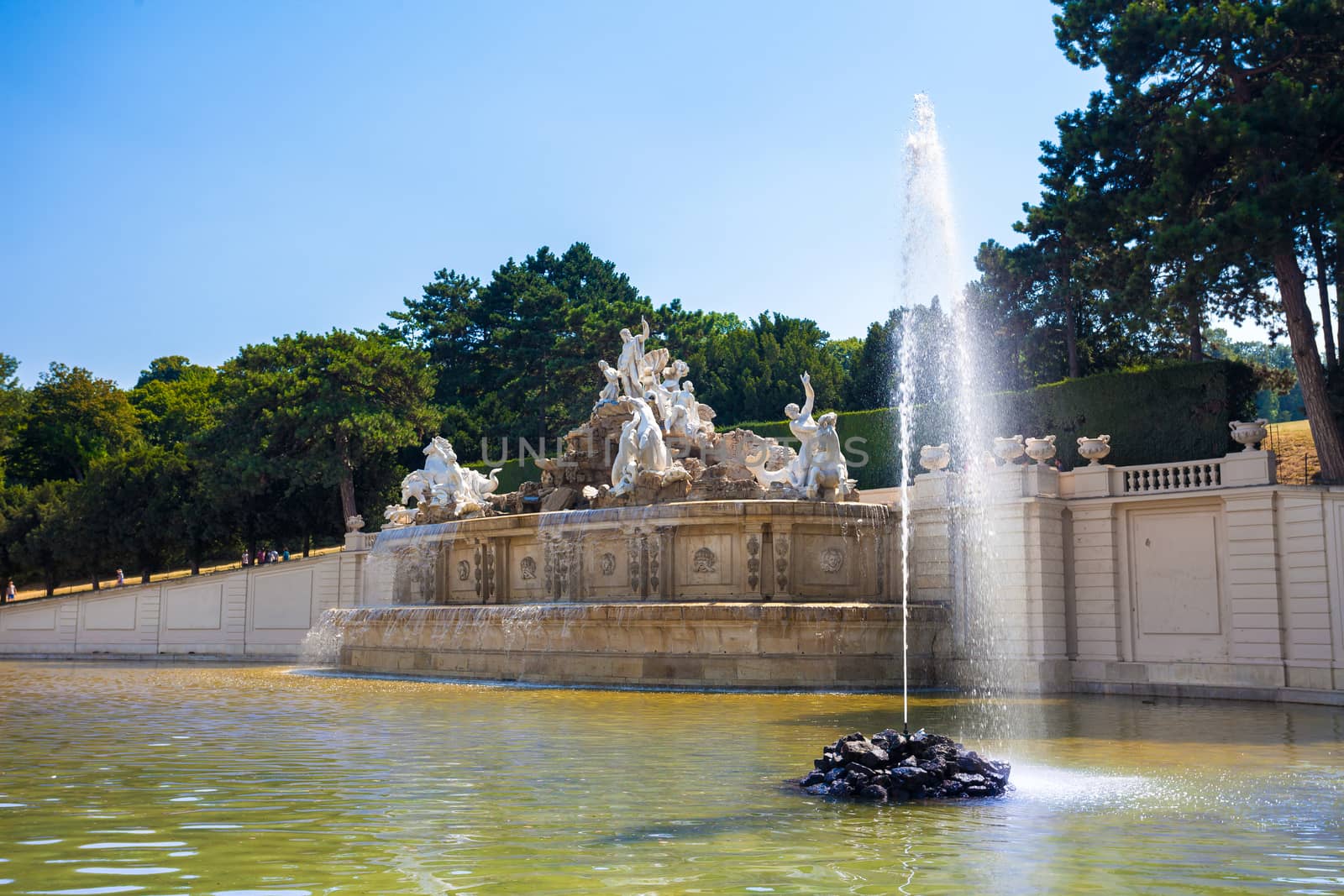 AUSTRIA, VIENNA - AUGUST 4,2013: View on Gloriette and Neptune fountain in Schonbrunn Palace, Vienna, Austria