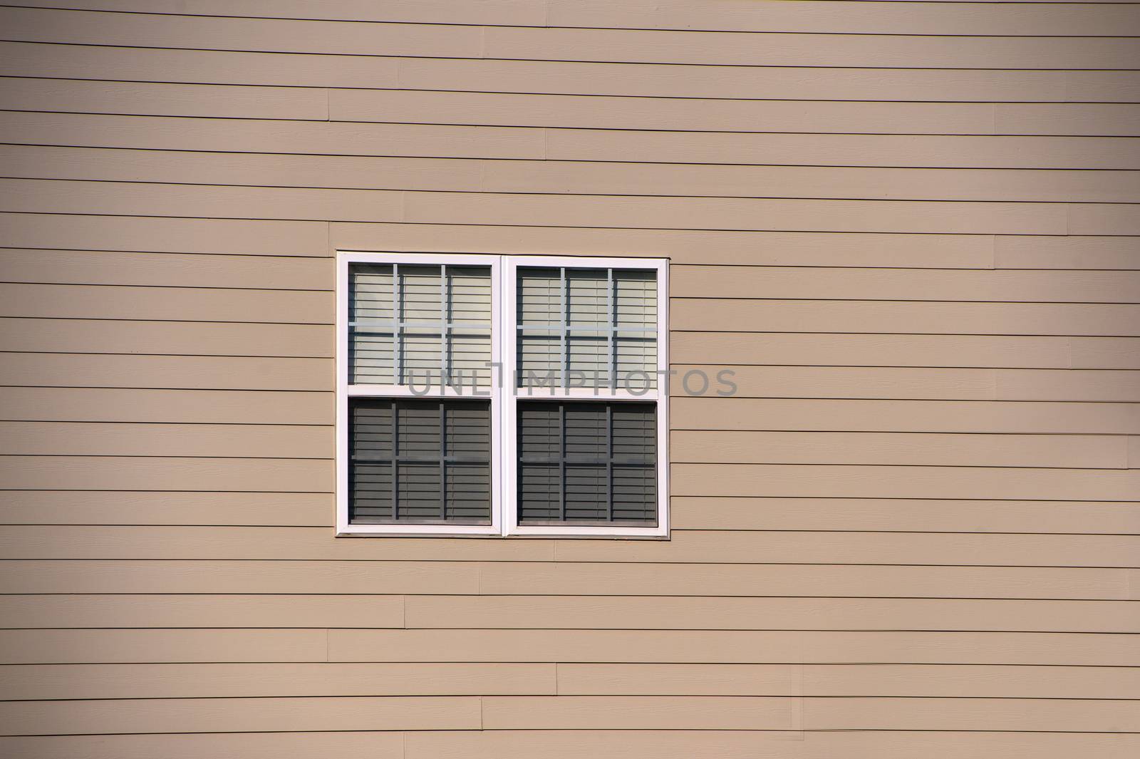 Window against vinyl siding at a local community